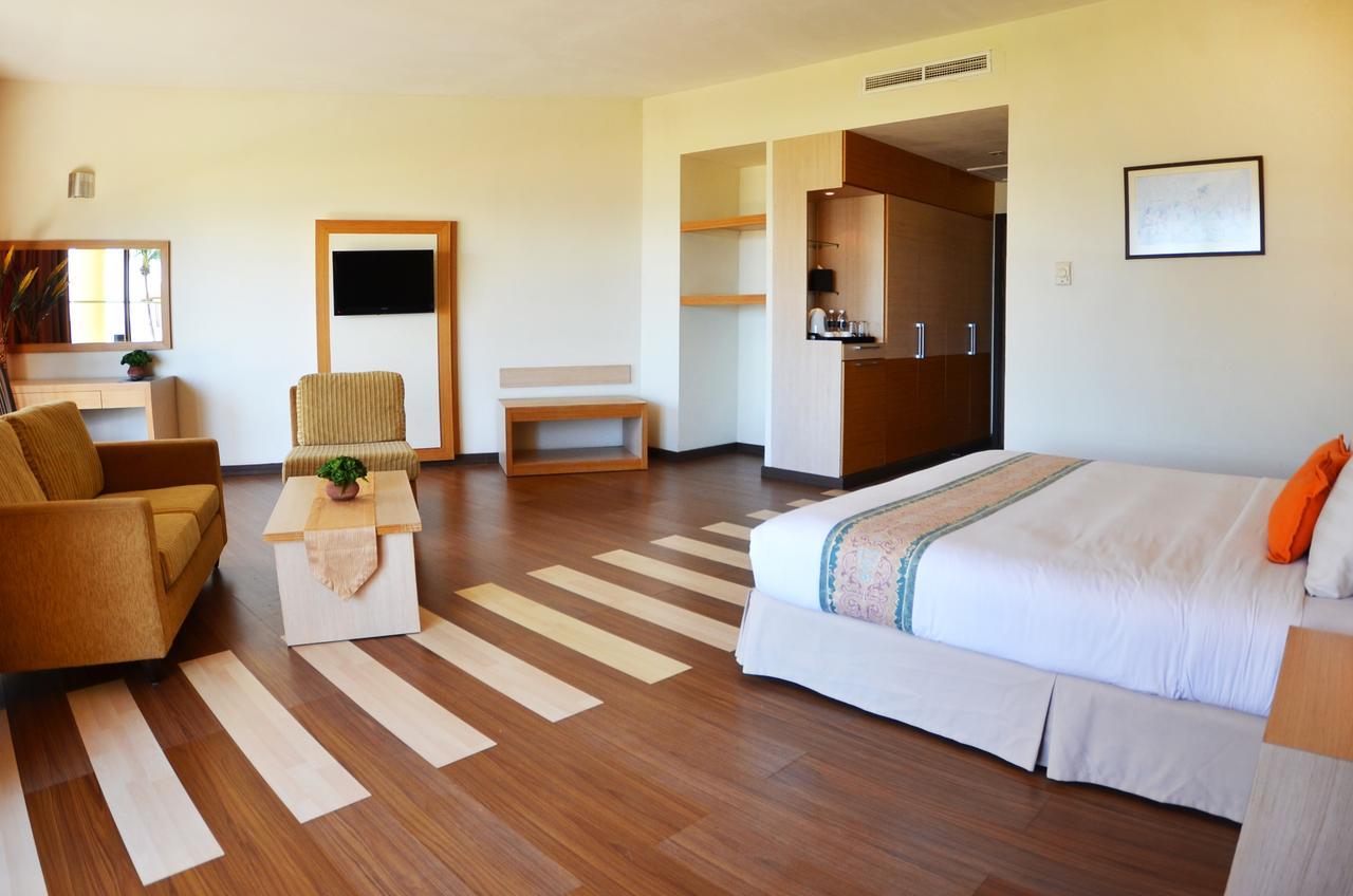 Damai Puri Resort & Spa Кучинг Экстерьер фото A room at the hotel
